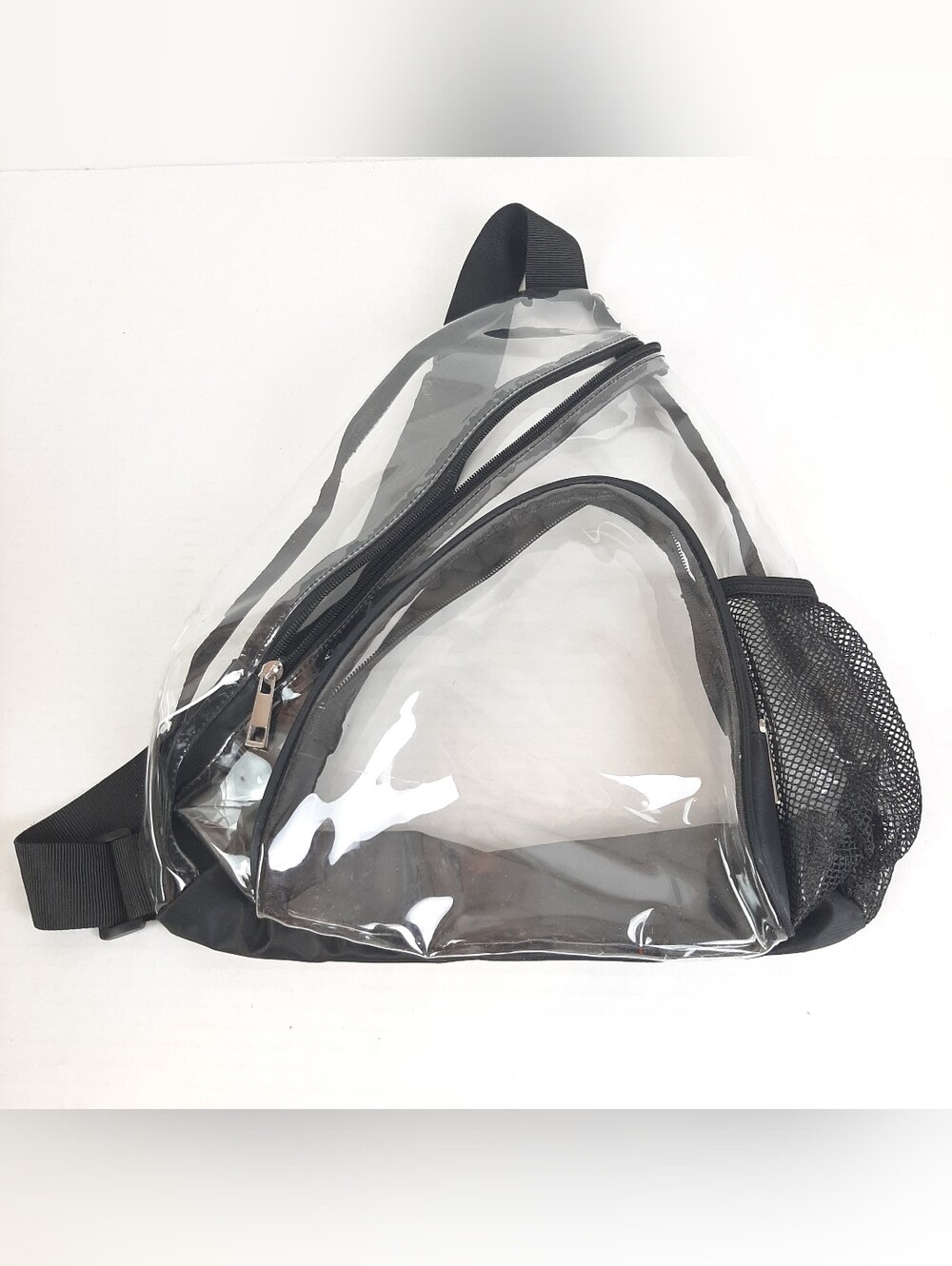🛍Clear PVC waterproof sling bag with black trim accents and a mesh pocket